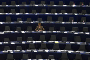 A Member of the European Parliament attends a debate on the situation in Ukraine at the European Parliament in Strasbourg, February 26, 2014. REUTERS/Vincent Kessler (FRANCE - Tags: POLITICS)